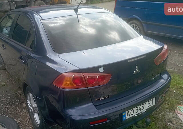 Синий Мицубиси Лансер, объемом двигателя 1.47 л и пробегом 172 тыс. км за 6350 $, фото 3 на Automoto.ua