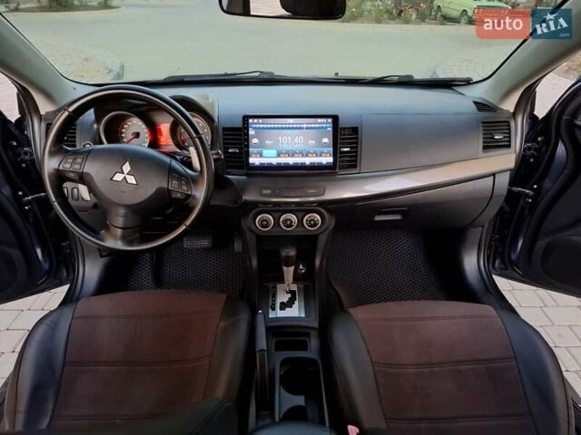 Синій Міцубісі Lancer, об'ємом двигуна 2 л та пробігом 234 тис. км за 6700 $, фото 17 на Automoto.ua