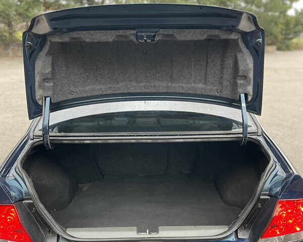 Синий Мицубиси Лансер, объемом двигателя 1.6 л и пробегом 185 тыс. км за 4950 $, фото 15 на Automoto.ua