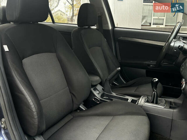 Синій Міцубісі Lancer, об'ємом двигуна 2 л та пробігом 222 тис. км за 5999 $, фото 12 на Automoto.ua