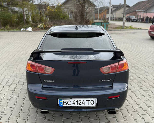 Синий Мицубиси Лансер, объемом двигателя 2 л и пробегом 326 тыс. км за 5650 $, фото 8 на Automoto.ua