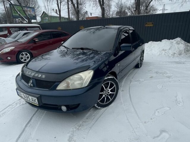 Синий Мицубиси Лансер, объемом двигателя 1.6 л и пробегом 319 тыс. км за 3700 $, фото 4 на Automoto.ua