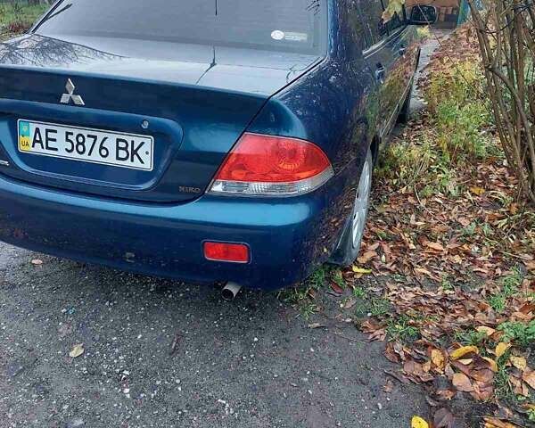 Синий Мицубиси Лансер, объемом двигателя 1.6 л и пробегом 87 тыс. км за 6800 $, фото 1 на Automoto.ua