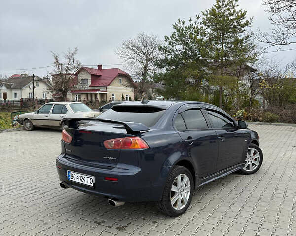 Синий Мицубиси Лансер, объемом двигателя 2 л и пробегом 326 тыс. км за 5650 $, фото 5 на Automoto.ua