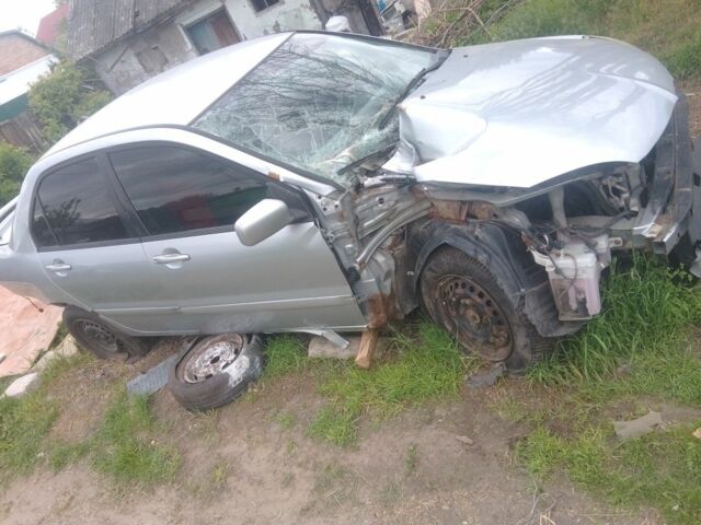 Синій Міцубісі Lancer, об'ємом двигуна 1.6 л та пробігом 100 тис. км за 842 $, фото 4 на Automoto.ua