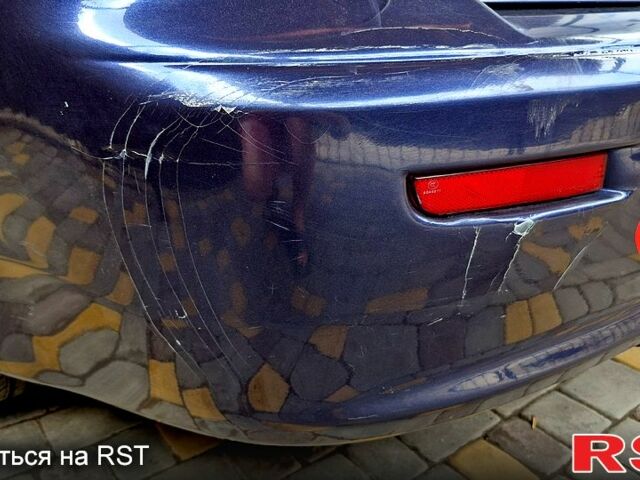 Синій Міцубісі Lancer, об'ємом двигуна 2 л та пробігом 248 тис. км за 5000 $, фото 2 на Automoto.ua