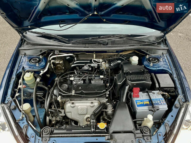 Синий Мицубиси Лансер, объемом двигателя 1.6 л и пробегом 185 тыс. км за 4950 $, фото 16 на Automoto.ua