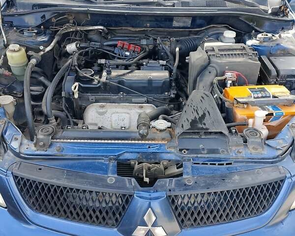 Синій Міцубісі Lancer, об'ємом двигуна 1.58 л та пробігом 317 тис. км за 3600 $, фото 21 на Automoto.ua