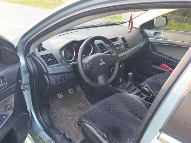 Міцубісі Lancer 2007 у Кременчуге на Automoto.ua Синій Міцубісі Lancer, об'ємом двигуна 2 л та пробігом 160 тис. км за 6500 $, фото 11 на Automoto.ua