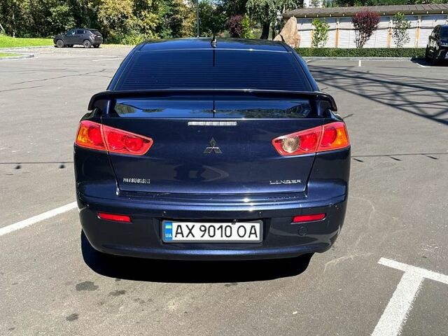 Синій Міцубісі Lancer, об'ємом двигуна 2 л та пробігом 300 тис. км за 5850 $, фото 5 на Automoto.ua