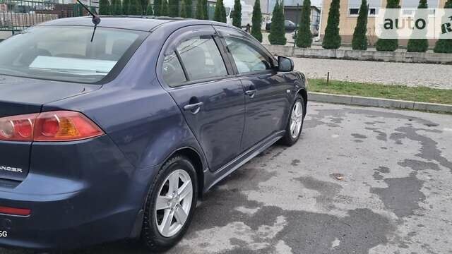 Синій Міцубісі Lancer, об'ємом двигуна 1.5 л та пробігом 206 тис. км за 5700 $, фото 9 на Automoto.ua