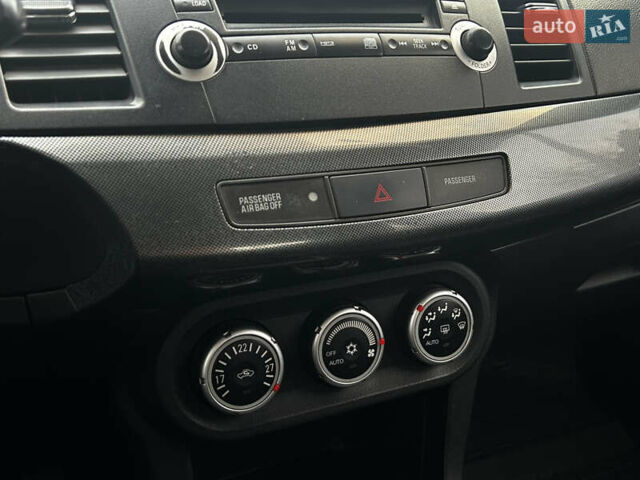 Синій Міцубісі Lancer, об'ємом двигуна 2 л та пробігом 222 тис. км за 5999 $, фото 11 на Automoto.ua