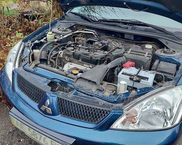 Синий Мицубиси Лансер, объемом двигателя 1.6 л и пробегом 87 тыс. км за 6800 $, фото 2 на Automoto.ua