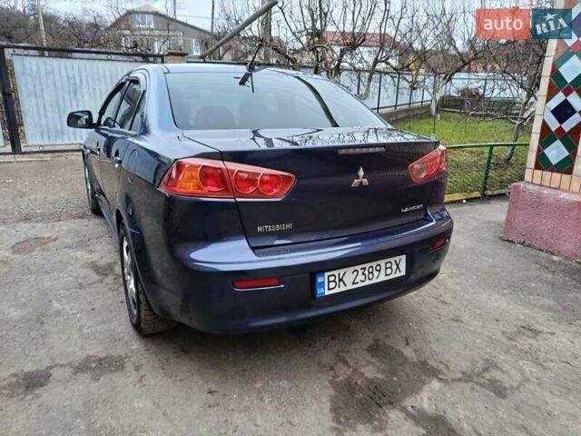 Синий Мицубиси Лансер, объемом двигателя 1.5 л и пробегом 211 тыс. км за 5222 $, фото 14 на Automoto.ua