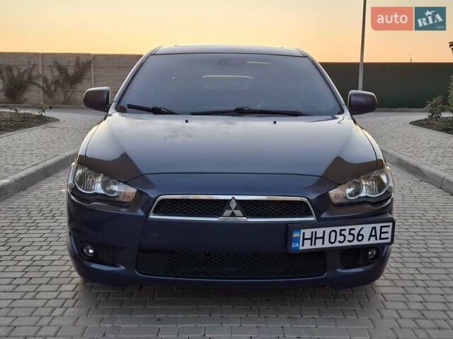 Синій Міцубісі Lancer, об'ємом двигуна 2 л та пробігом 234 тис. км за 6700 $, фото 1 на Automoto.ua