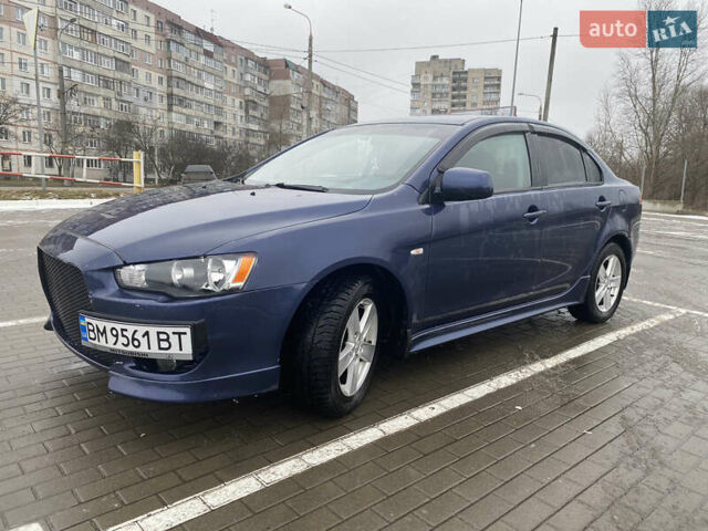 Синий Мицубиси Лансер, объемом двигателя 2 л и пробегом 193 тыс. км за 6800 $, фото 2 на Automoto.ua