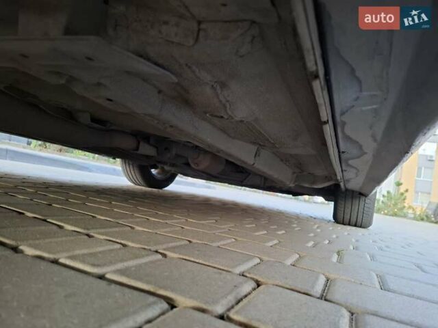 Синій Міцубісі Lancer, об'ємом двигуна 2 л та пробігом 234 тис. км за 6700 $, фото 18 на Automoto.ua