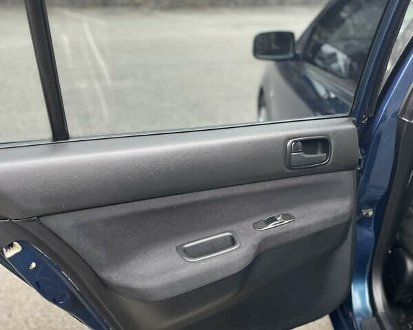 Синий Мицубиси Лансер, объемом двигателя 1.6 л и пробегом 184 тыс. км за 4950 $, фото 19 на Automoto.ua