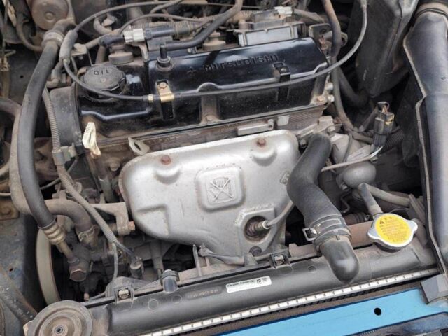 Синий Мицубиси Лансер, объемом двигателя 1.6 л и пробегом 87 тыс. км за 7000 $, фото 4 на Automoto.ua