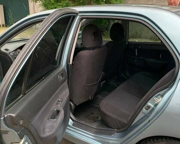 Синий Мицубиси Лансер, объемом двигателя 1.6 л и пробегом 270 тыс. км за 4600 $, фото 6 на Automoto.ua