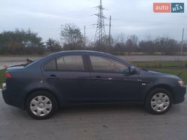 Синий Мицубиси Лансер, объемом двигателя 1.5 л и пробегом 260 тыс. км за 5000 $, фото 17 на Automoto.ua