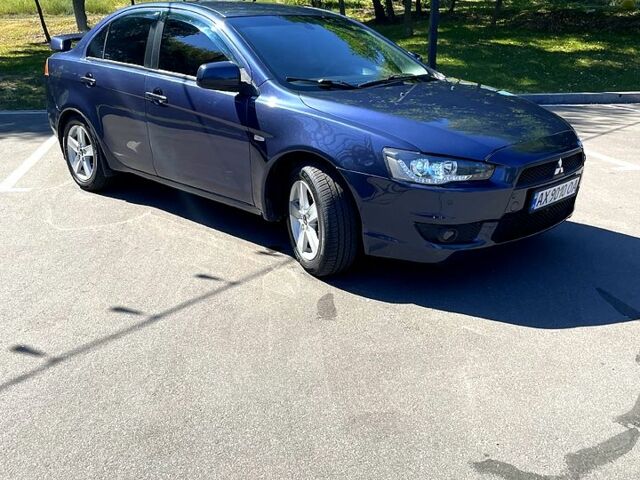Синій Міцубісі Lancer, об'ємом двигуна 2 л та пробігом 300 тис. км за 5850 $, фото 4 на Automoto.ua