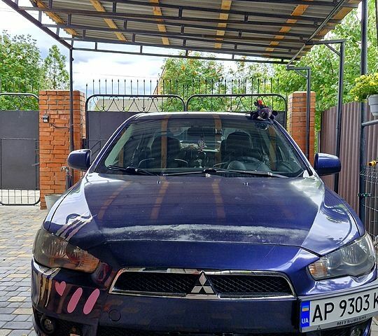 Синій Міцубісі Lancer, об'ємом двигуна 2 л та пробігом 248 тис. км за 5000 $, фото 3 на Automoto.ua