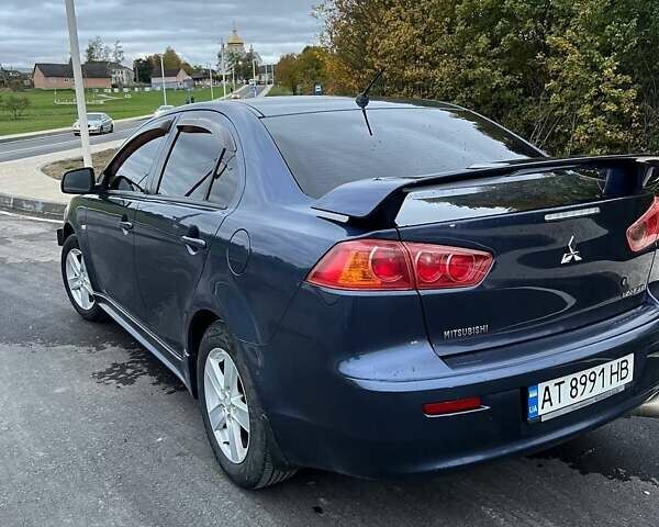Синій Міцубісі Lancer, об'ємом двигуна 2 л та пробігом 190 тис. км за 6700 $, фото 7 на Automoto.ua