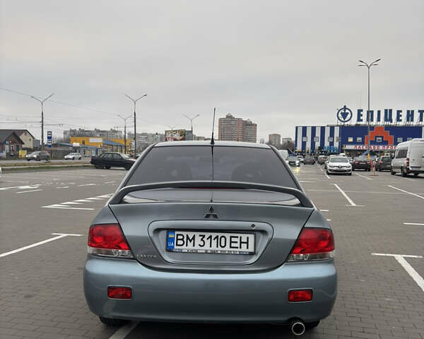 Синий Мицубиси Лансер, объемом двигателя 1.6 л и пробегом 238 тыс. км за 3500 $, фото 4 на Automoto.ua