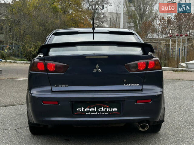 Синій Міцубісі Lancer, об'ємом двигуна 2 л та пробігом 222 тис. км за 5999 $, фото 3 на Automoto.ua