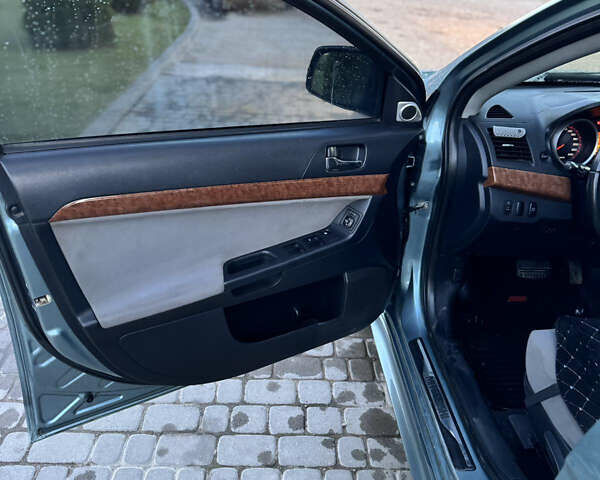 Міцубісі Lancer 2007 у Самборе на Automoto.ua Синій Міцубісі Lancer, об'ємом двигуна 1.5 л та пробігом 201 тис. км за 6000 $, фото 18 на Automoto.ua