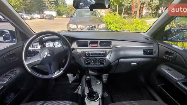 Синій Міцубісі Lancer, об'ємом двигуна 1.6 л та пробігом 198 тис. км за 4800 $, фото 9 на Automoto.ua