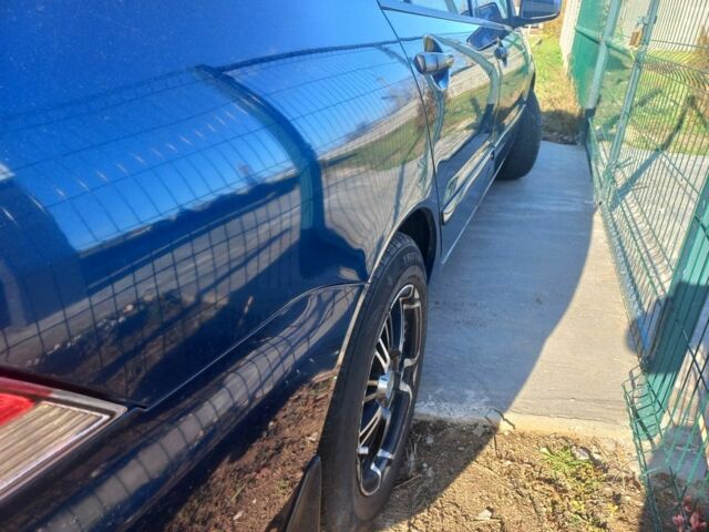 Синій Міцубісі Lancer, об'ємом двигуна 1 л та пробігом 111 тис. км за 3100 $, фото 3 на Automoto.ua