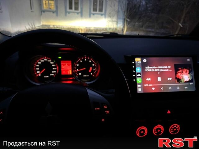 Синий Мицубиси Лансер, объемом двигателя 2 л и пробегом 176 тыс. км за 6400 $, фото 3 на Automoto.ua