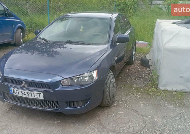 Синий Мицубиси Лансер, объемом двигателя 1.47 л и пробегом 172 тыс. км за 6350 $, фото 1 на Automoto.ua