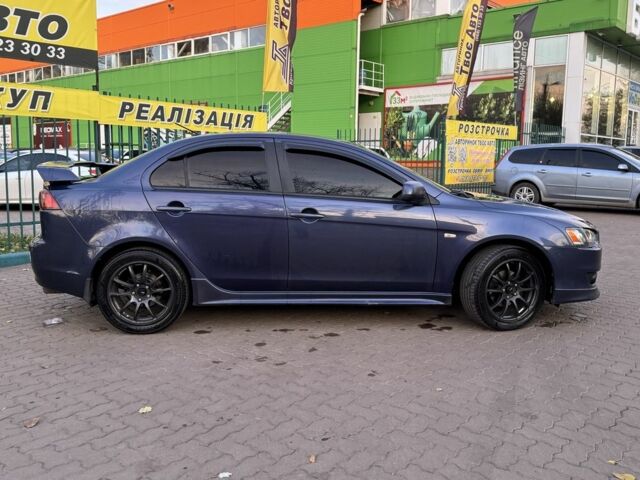 Синій Міцубісі Lancer, об'ємом двигуна 2 л та пробігом 189 тис. км за 7350 $, фото 6 на Automoto.ua