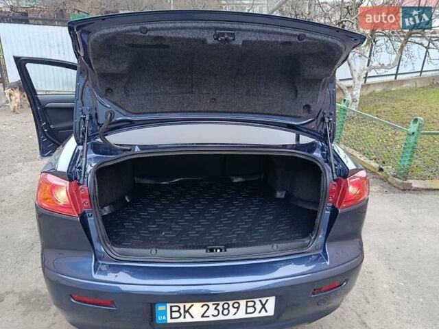 Синий Мицубиси Лансер, объемом двигателя 1.5 л и пробегом 211 тыс. км за 5222 $, фото 29 на Automoto.ua