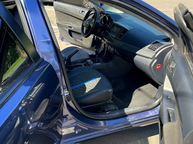 Синій Міцубісі Lancer, об'ємом двигуна 2 л та пробігом 300 тис. км за 5850 $, фото 6 на Automoto.ua