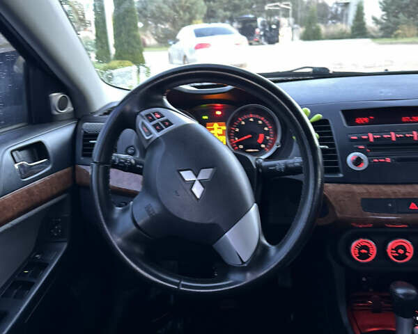 Міцубісі Lancer 2007 у Самборе на Automoto.ua Синій Міцубісі Lancer, об'ємом двигуна 1.5 л та пробігом 201 тис. км за 6000 $, фото 15 на Automoto.ua