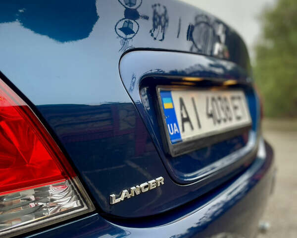 Синий Мицубиси Лансер, объемом двигателя 1.6 л и пробегом 185 тыс. км за 4950 $, фото 14 на Automoto.ua