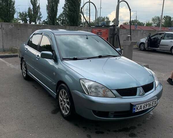 Синий Мицубиси Лансер, объемом двигателя 1.6 л и пробегом 270 тыс. км за 4600 $, фото 3 на Automoto.ua