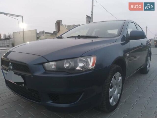 Синий Мицубиси Лансер, объемом двигателя 1.5 л и пробегом 260 тыс. км за 5000 $, фото 6 на Automoto.ua