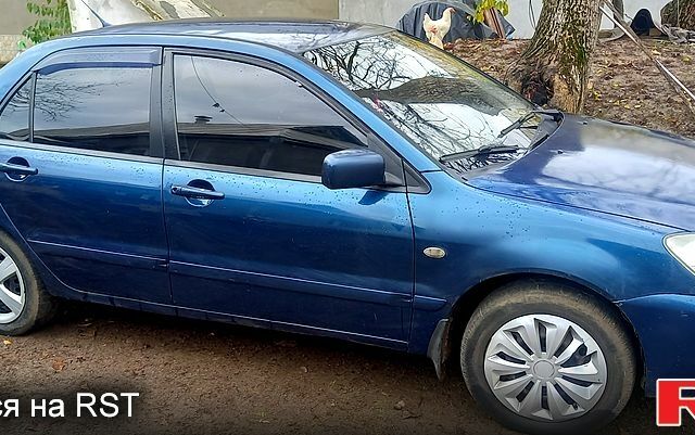 Мицубиси Лансер 2007 в Гайсине на Automoto.ua Синий Мицубиси Лансер, объемом двигателя 1.6 л и пробегом 274 тыс. км за 2700 $, фото 3 на Automoto.ua
