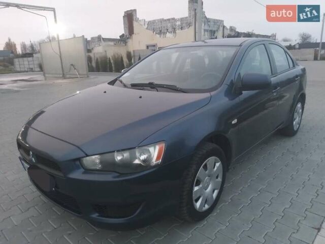 Синий Мицубиси Лансер, объемом двигателя 1.5 л и пробегом 260 тыс. км за 5000 $, фото 1 на Automoto.ua