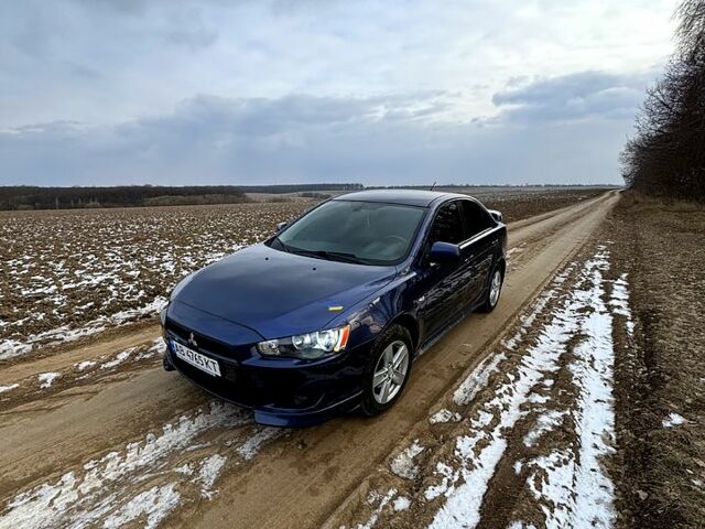 Синий Мицубиси Лансер, объемом двигателя 2 л и пробегом 176 тыс. км за 6400 $, фото 2 на Automoto.ua