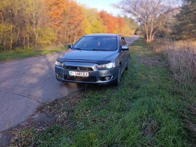 Міцубісі Lancer 2007 у Кременчуге на Automoto.ua Синій Міцубісі Lancer, об'ємом двигуна 2 л та пробігом 160 тис. км за 6500 $, фото 2 на Automoto.ua