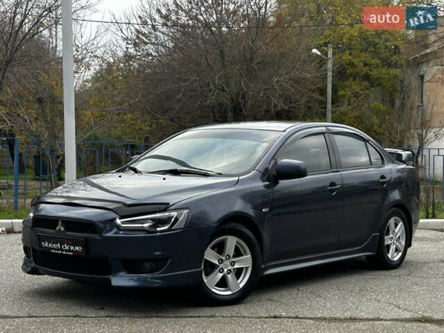Синій Міцубісі Lancer, об'ємом двигуна 2 л та пробігом 222 тис. км за 5999 $, фото 6 на Automoto.ua