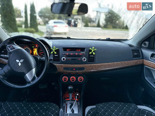 Міцубісі Lancer 2007 у Самборе на Automoto.ua Синій Міцубісі Lancer, об'ємом двигуна 1.5 л та пробігом 201 тис. км за 6000 $, фото 16 на Automoto.ua