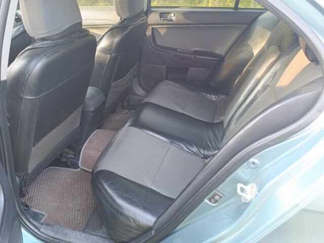 Міцубісі Lancer 2007 у Кременчуге на Automoto.ua Синій Міцубісі Lancer, об'ємом двигуна 2 л та пробігом 160 тис. км за 6500 $, фото 13 на Automoto.ua