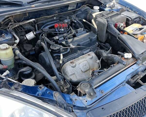 Синій Міцубісі Lancer, об'ємом двигуна 1.58 л та пробігом 317 тис. км за 3600 $, фото 18 на Automoto.ua